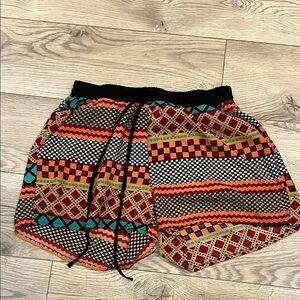 Ezra shorts- very colorful and lightweight, I believe size medium
